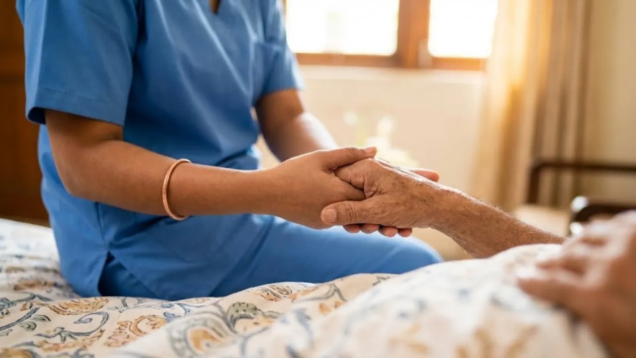 Nurse caring for patient at home